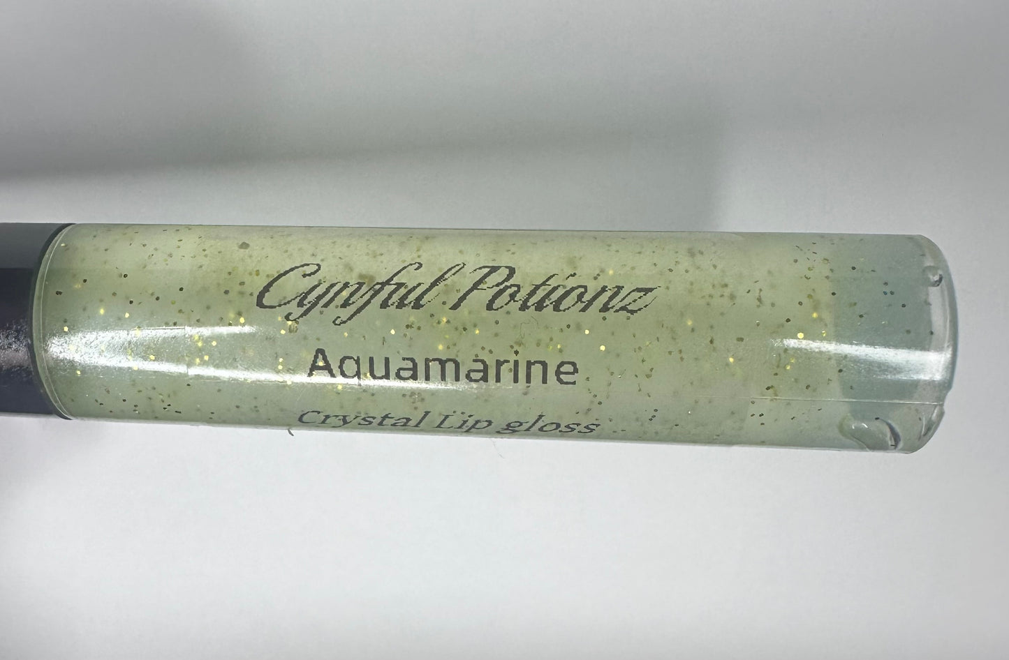 Clear lip gloss Infused with Aquamarine Stones (Limited Stock) on Sale!