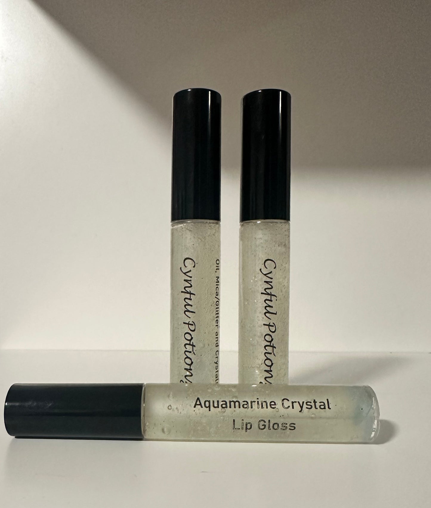 Clear lip gloss Infused with Aquamarine Stones (Limited Stock) on Sale!