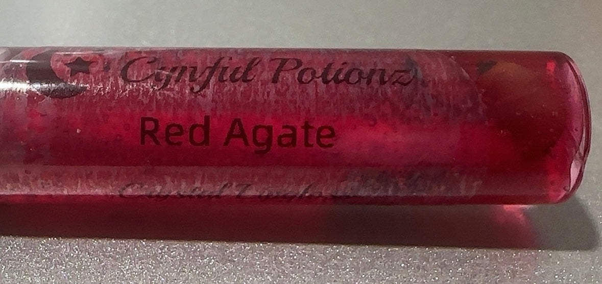 Lip gloss infused with Red Agate Stones